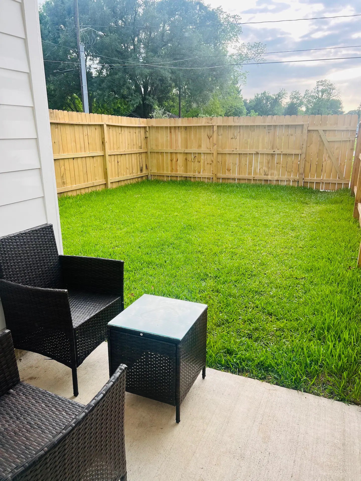 8508 Wileyvale Road, Unit B Houston, TX 77016 - Photo 15 of 16 a view of a backyard with wooden fence