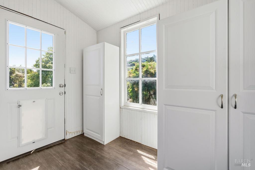 411 Main Street Sausalito, CA 94965 - Photo 12 of 33 Sun porch from another angle takes you down the back stairs to garden, yard & basement