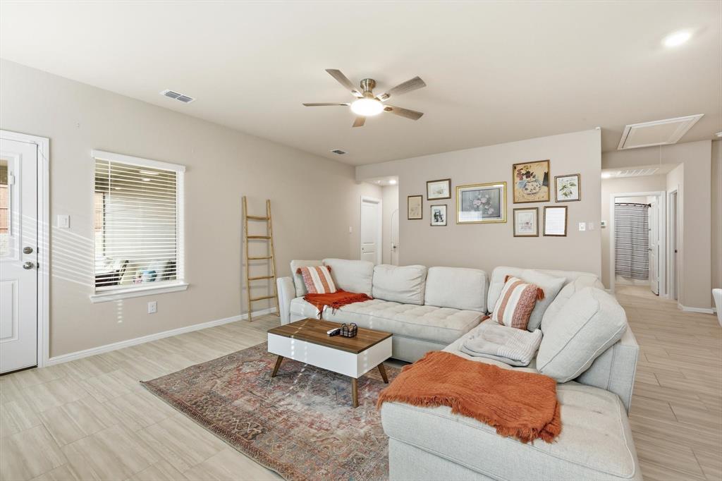 5344 Flannel Lane Krum, TX 76249 - Photo 20 of 40 a living room with furniture and a window