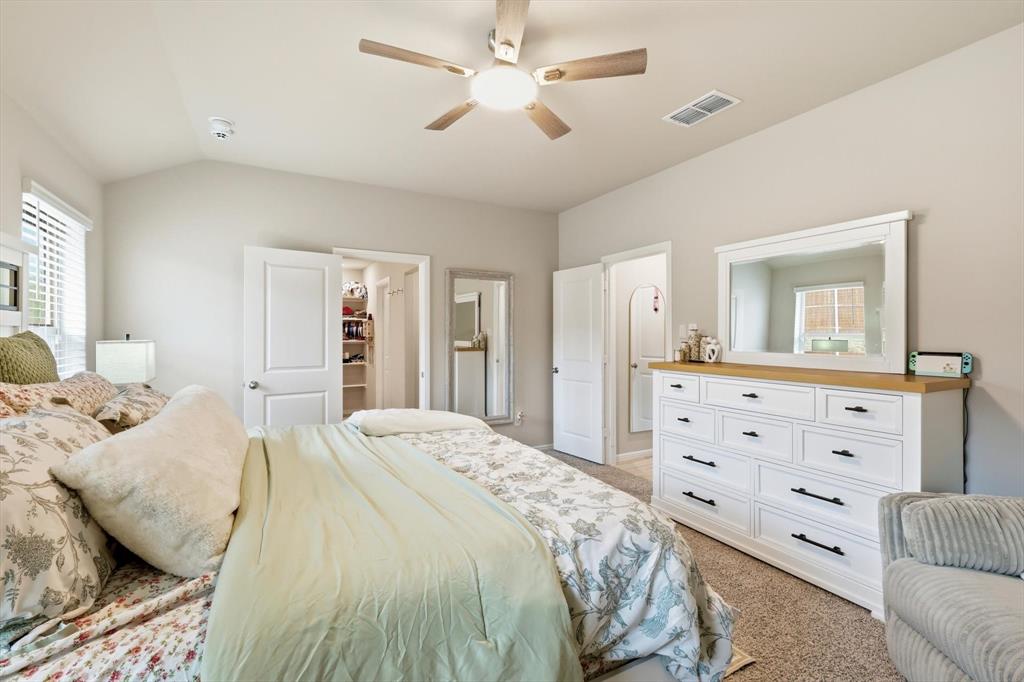 5344 Flannel Lane Krum, TX 76249 - Photo 27 of 40 a bedroom with a bed and ceiling fan