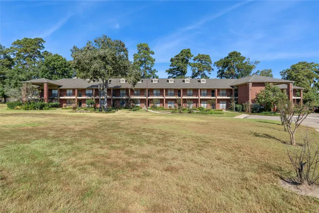 a view of a house with outdoor space and sitting space