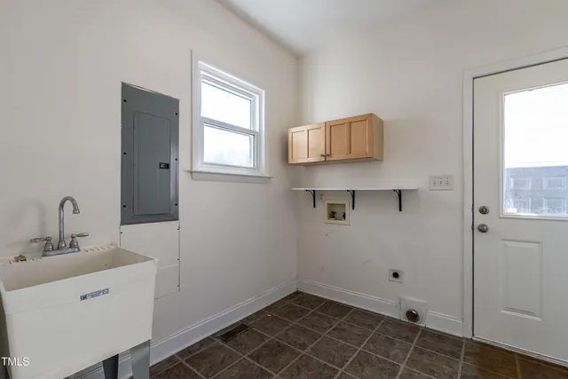 a bathroom with a sink toilet and vanity