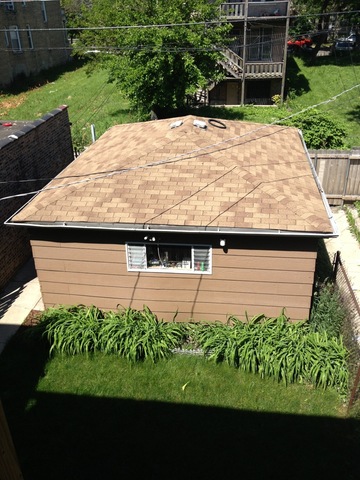 1842 South Drake Avenue Chicago, IL 60623 - Photo 22 of 25 a backyard of a house with lots of green space