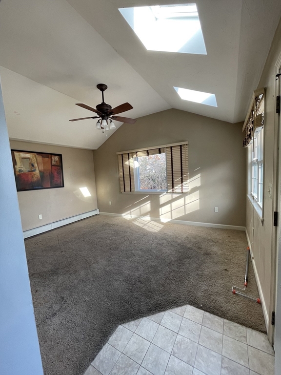 2 Eagle Rock Road, Unit 1 Randolph, MA 02368 - Photo 2 of 8 a view of a livingroom with a ceiling fan and window