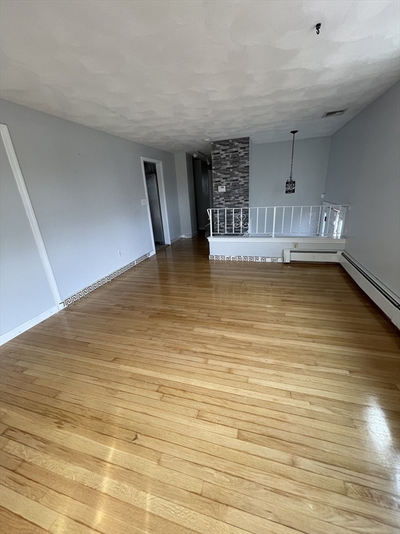 2 Eagle Rock Road, Unit 1 Randolph, MA 02368 - Photo 5 of 8 a view of a swimming pool and window