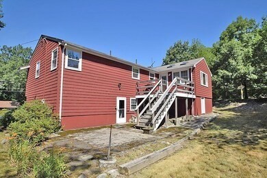 2 Eagle Rock Road, Unit 1 Randolph, MA 02368 - Photo 8 of 8 a view of a house with a backyard