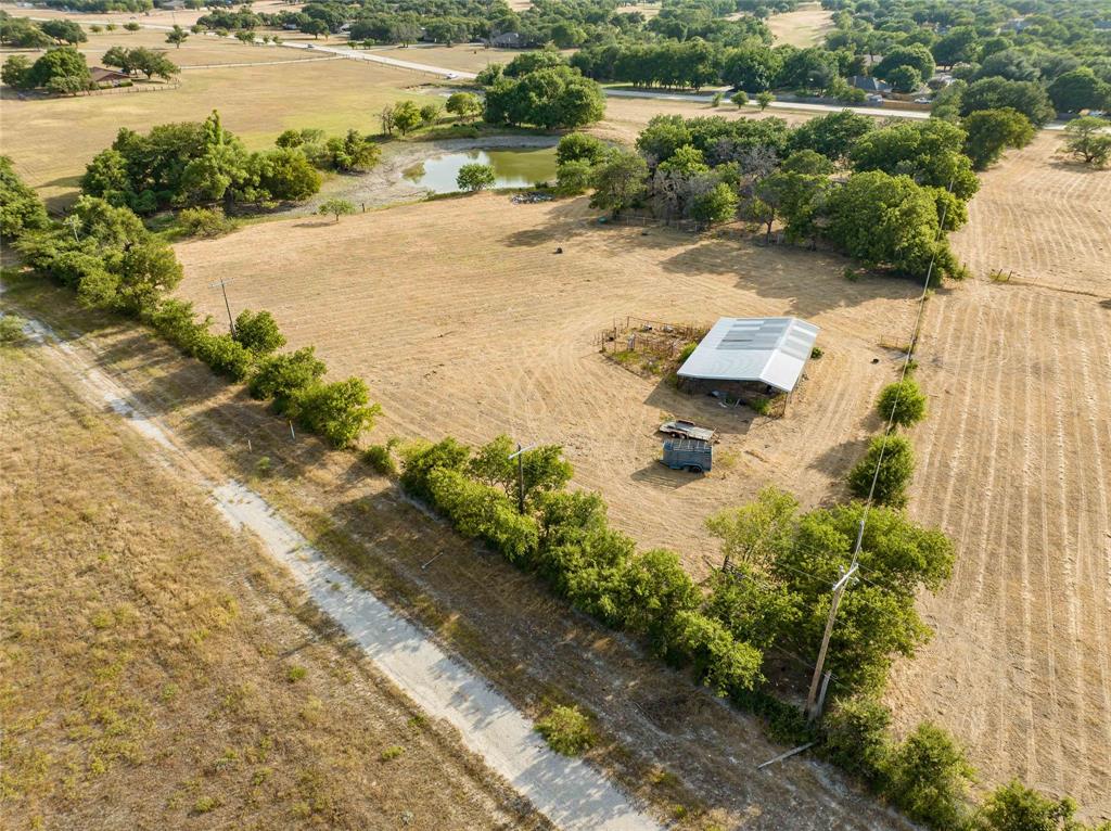 2000 Ranch House Road Willow Park, TX 76087 - Photo 18 of 34 a view of a lake with beach and residential space