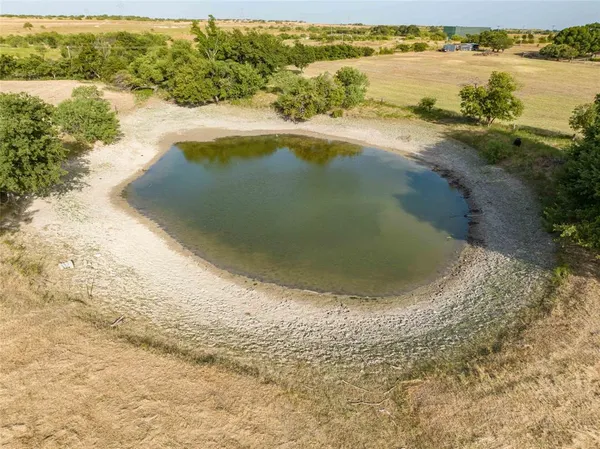 an aerial view of lake residential house with outdoor space