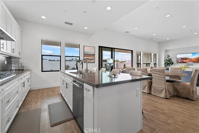 a kitchen with stainless steel appliances granite countertop lots of counter top space