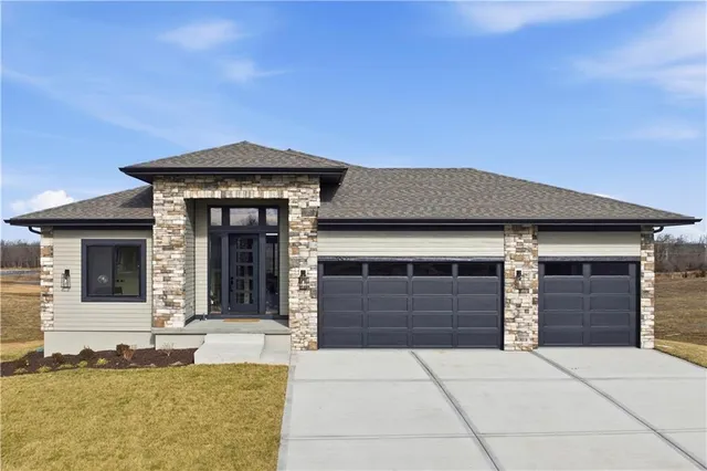 $854,100 | 2607 Northeast Woodland Court, Lee's Summit, MO 64086