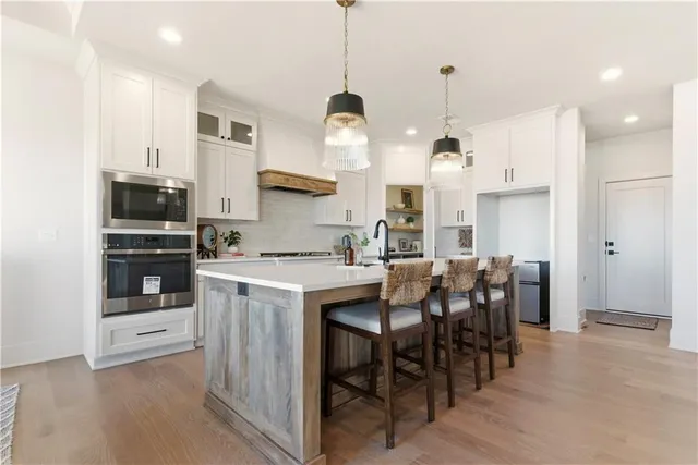 $854,100 | 2607 Northeast Woodland Court, Lee's Summit, MO 64086