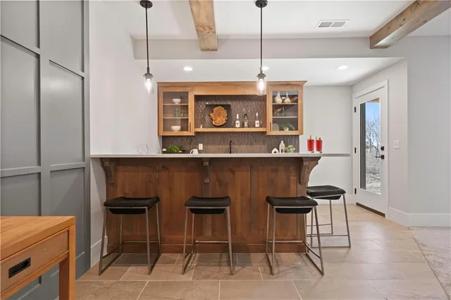 $854,100 | 2607 Northeast Woodland Court, Lee's Summit, MO 64086