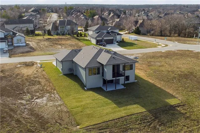 $854,100 | 2607 Northeast Woodland Court, Lee's Summit, MO 64086