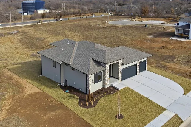 $854,100 | 2607 Northeast Woodland Court, Lee's Summit, MO 64086