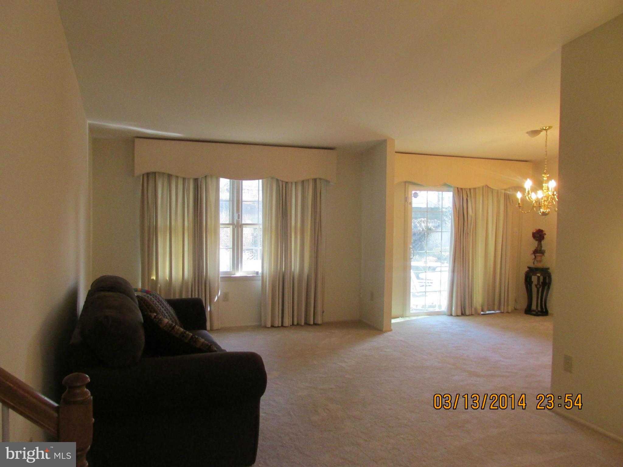 14901 Whitegate Road Silver Spring, MD 20905 - Photo 8 of 26 a living room with furniture and a window