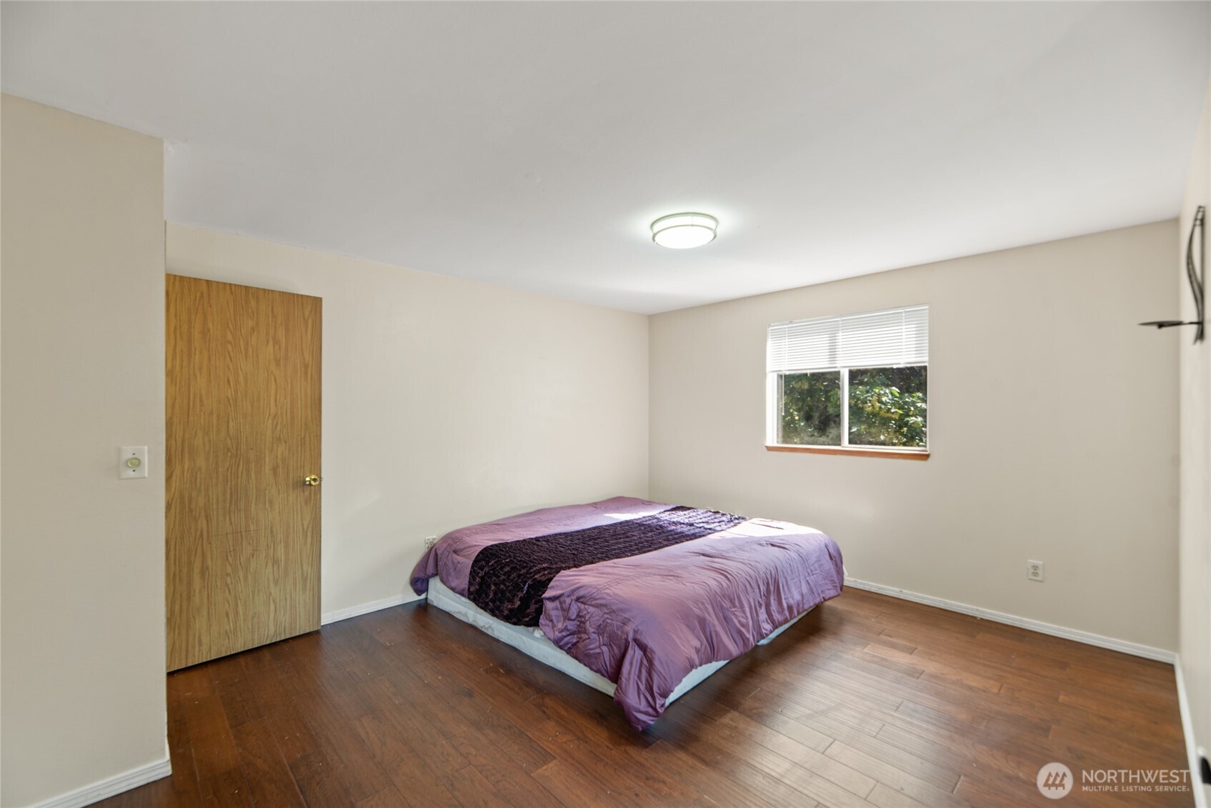 10606 68th Place South Seattle, WA 98178 - Photo 13 of 31 a bedroom with a bed and a window