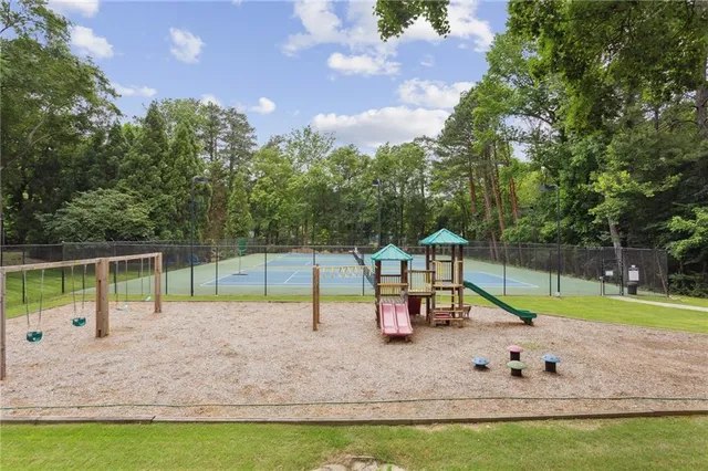a view of a park with swings