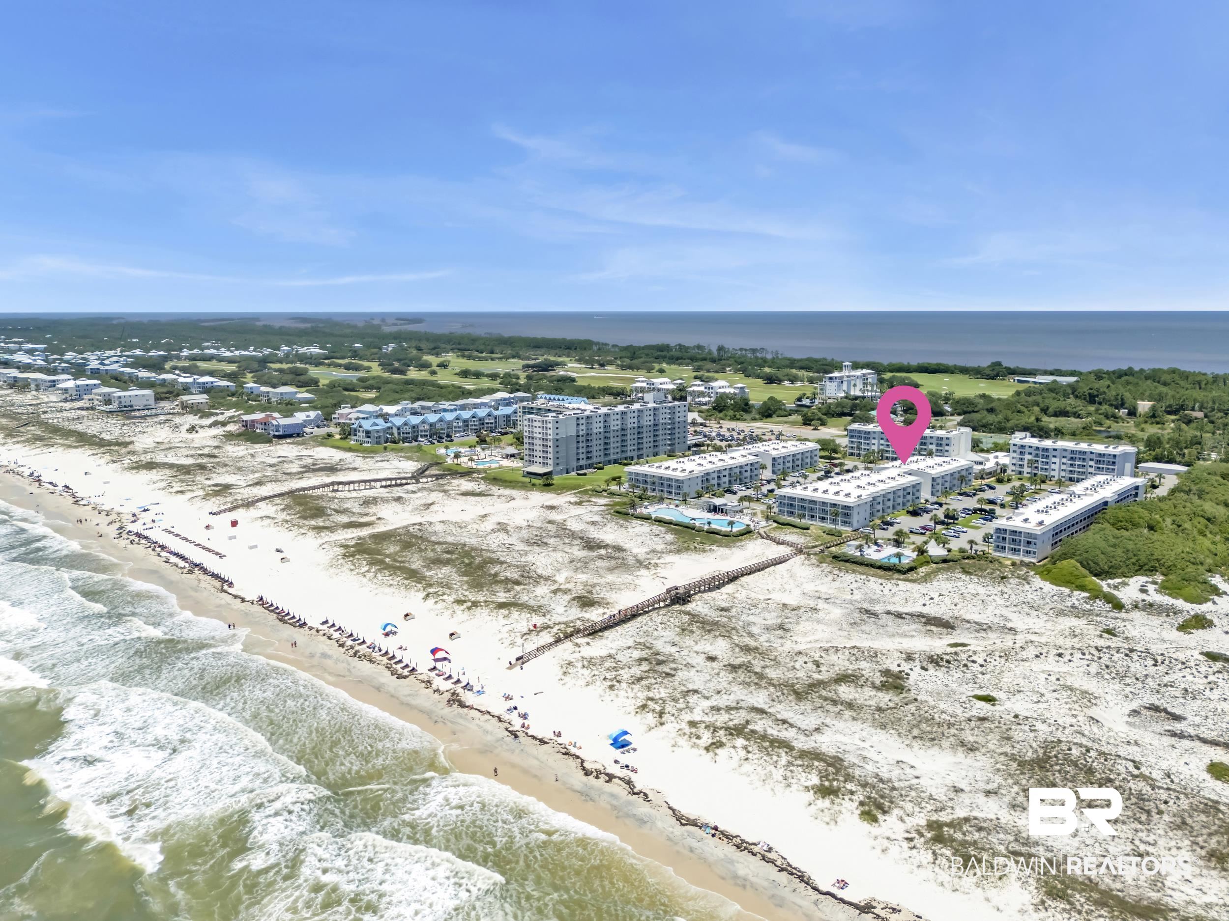 400 Plantation Road, Unit 2118 Gulf Shores, AL 36542 - Photo 50 of 59 Oceanfront condominium complex featuring multiple buildings, direct beach access via boardwalks, and a coastal setting