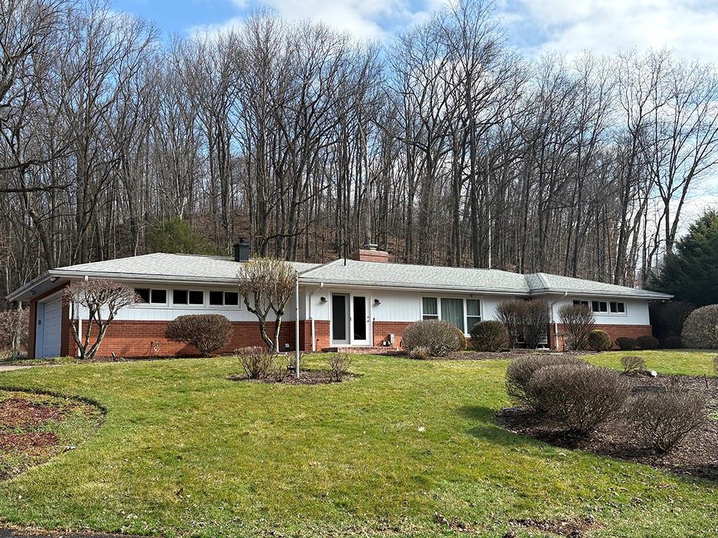 4400 West Pike Road Indiana, PA 15701 - Photo 1 of 37 a view of a house with a big yard potted plants and large tree