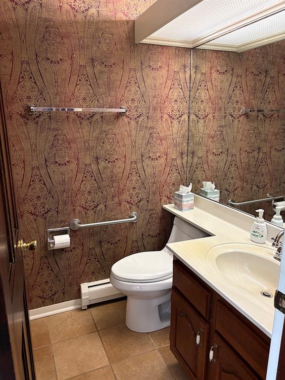 4400 West Pike Road Indiana, PA 15701 - Photo 11 of 37 a bathroom with a granite countertop toilet sink and mirror