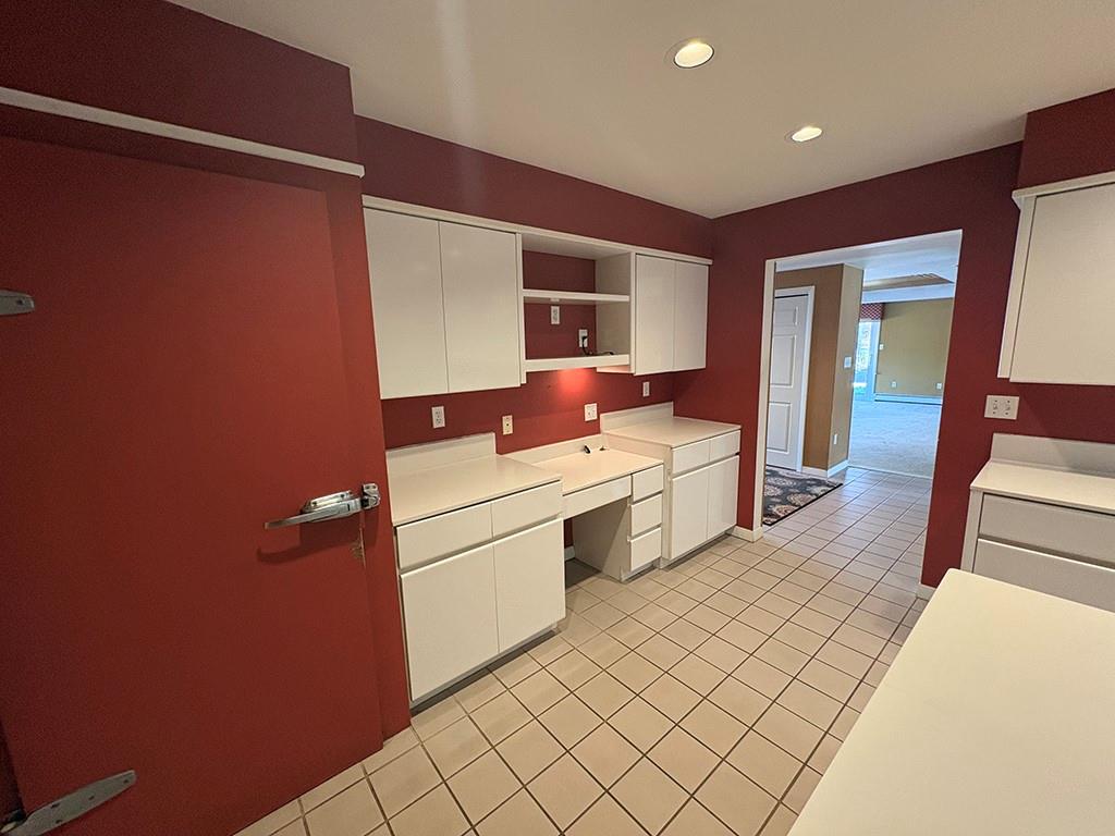 4400 West Pike Road Indiana, PA 15701 - Photo 15 of 37 a room with a chair and white cabinets