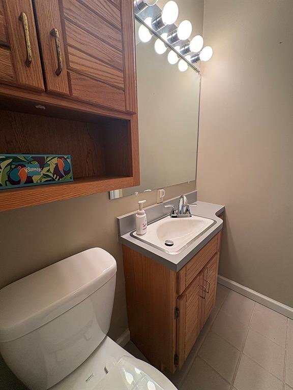 4400 West Pike Road Indiana, PA 15701 - Photo 17 of 37 a bathroom with a sink a mirror and a toilet
