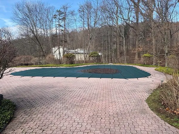 a view of a house with outdoor space and porch