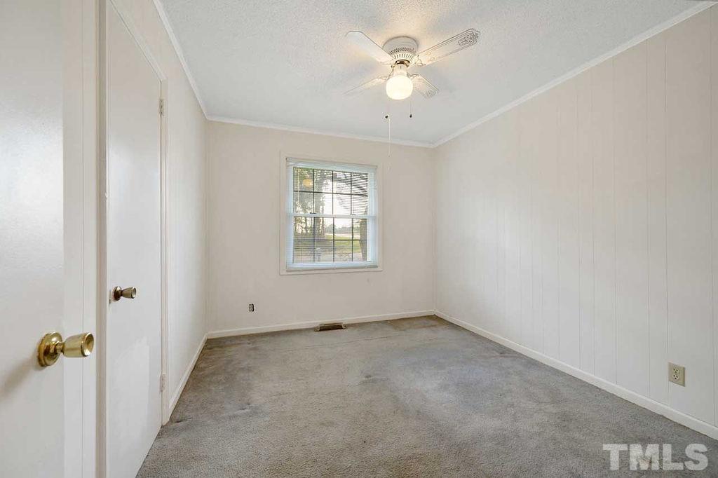 2930 Fairway Drive Raleigh, NC 27603 - Photo 12 of 24 an empty room with a window