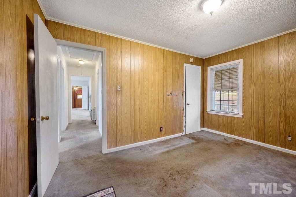 2930 Fairway Drive Raleigh, NC 27603 - Photo 17 of 24 a view of livingroom with an empty space and a window