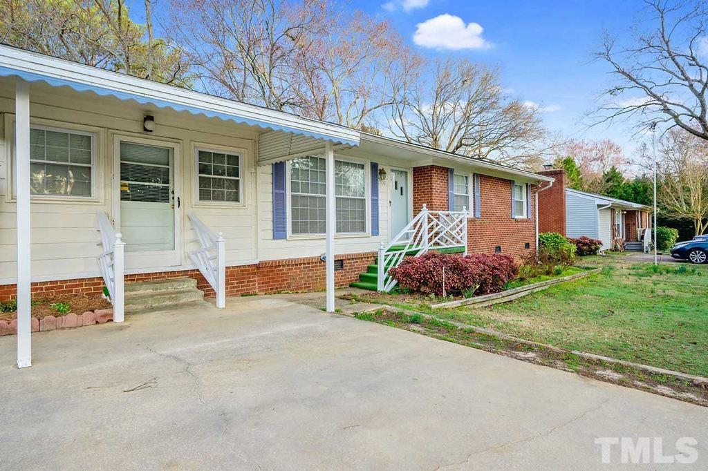 2930 Fairway Drive Raleigh, NC 27603 - Photo 2 of 24 front view of a house with a yard