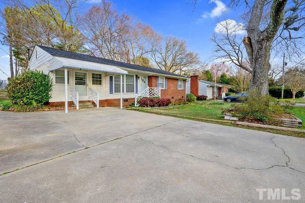 2930 Fairway Drive Raleigh, NC 27603 - Photo 4 of 24 a view of a house with a patio