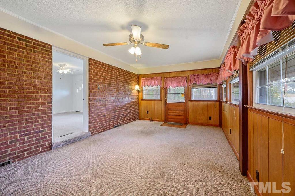 2930 Fairway Drive Raleigh, NC 27603 - Photo 8 of 24 a view of an empty room with a window
