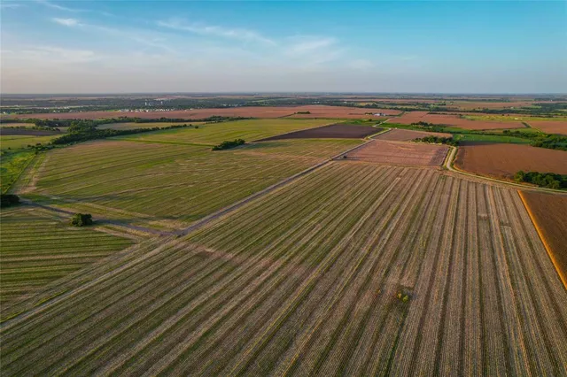 a view of a swimming pool and an outdoor seating