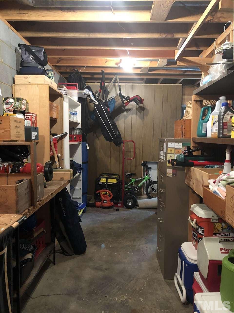 4909 Oak Park Road Raleigh, NC 27612 - Photo 6 of 11 This is a huge wired, basement workshop! Measures 21.4 feet x 7.5 feet!