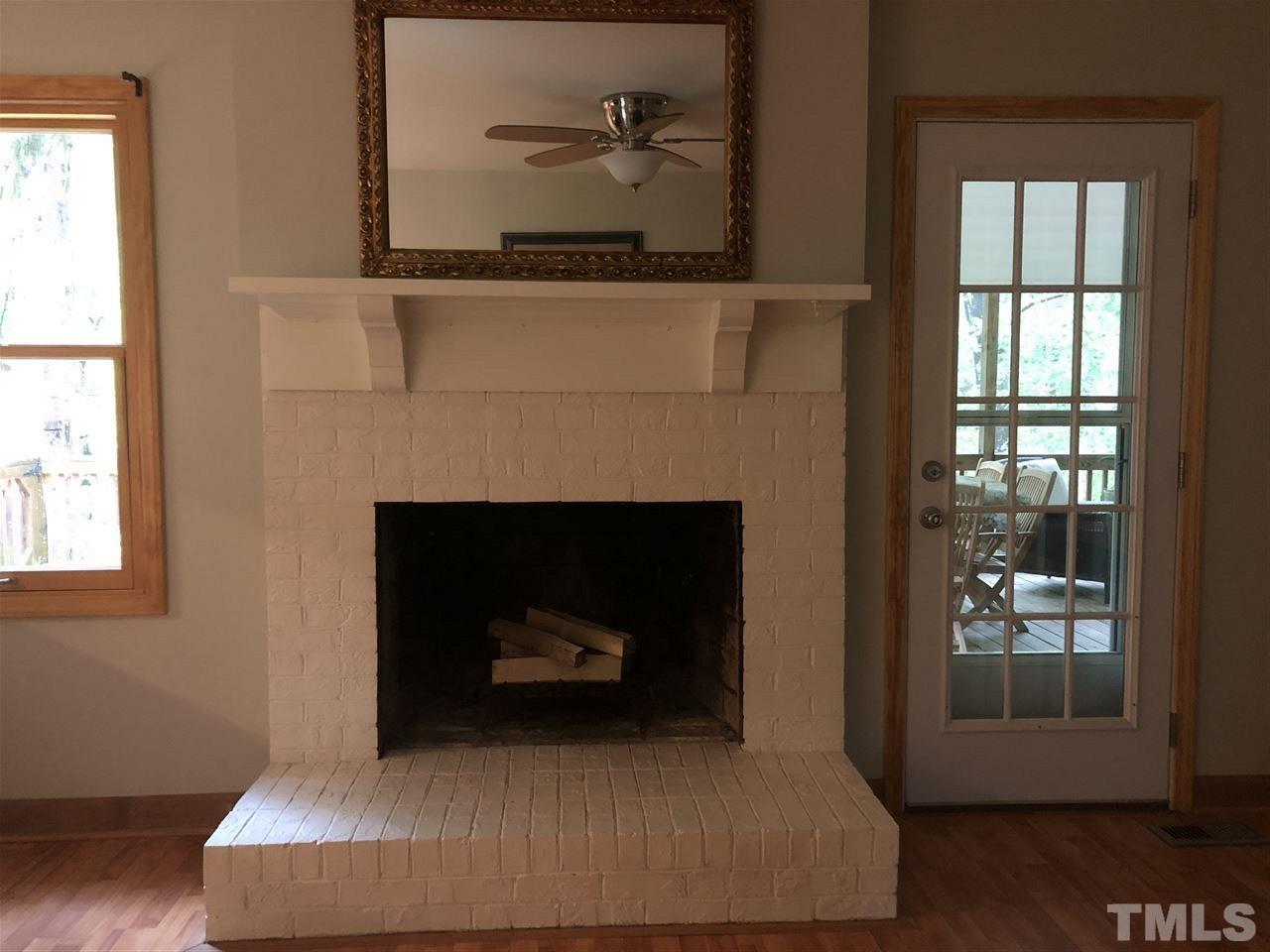 4909 Oak Park Road Raleigh, NC 27612 - Photo 8 of 11 This is in the family room next to the kitchen. The French door you see to the right leads to the WONDERFUL screen porch. The window to the left looks out over the upper back deck.