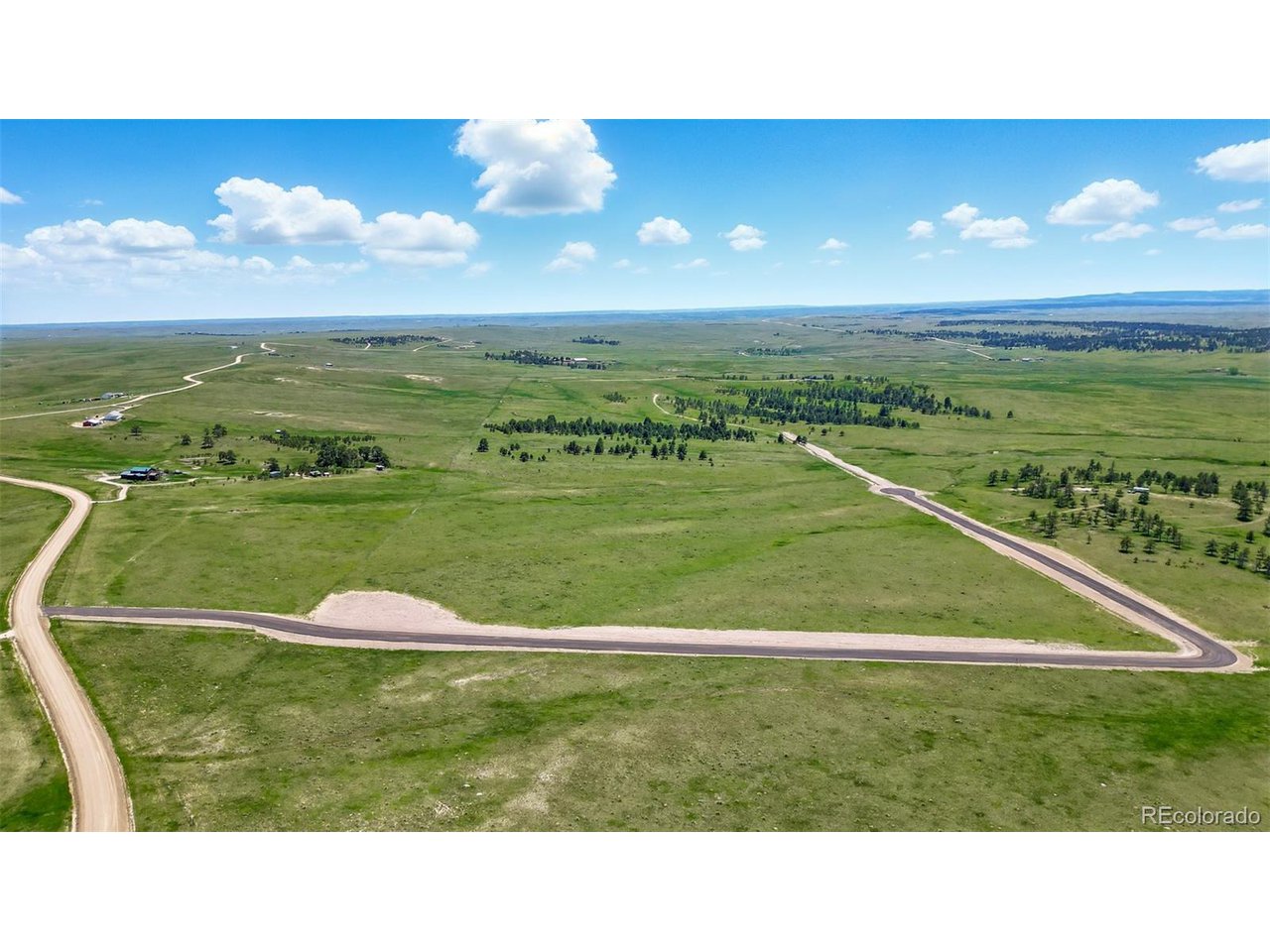 12 Paz Street Ramah, CO 80832 - Photo 7 of 11 a view of an ocean and a yard