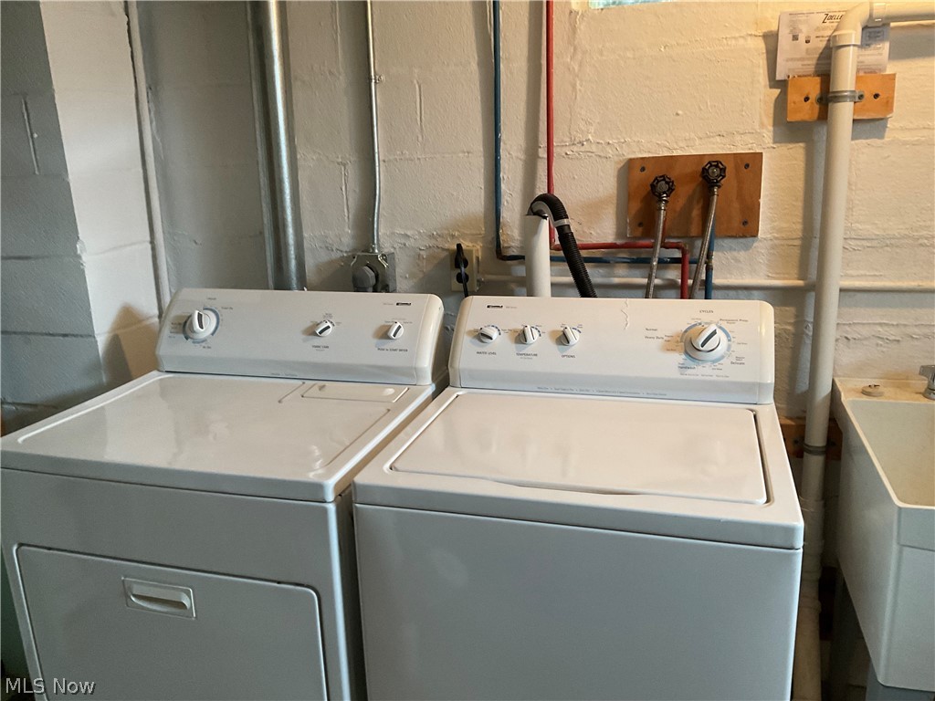 4702 Marigold Road Mentor, OH 44060 - Photo 12 of 18 Laundry room featuring sink, hookup for a washing machine, washer and clothes dryer, and electric dryer hookup