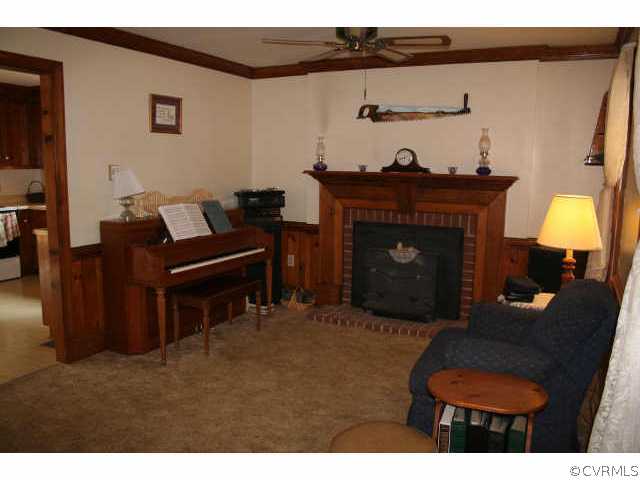 31 Morningside Road Cartersville, VA 23027 - Photo 3 of 9 Other - Living Room with Wood Stove Insert