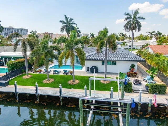 a view of an chairs and table in patio