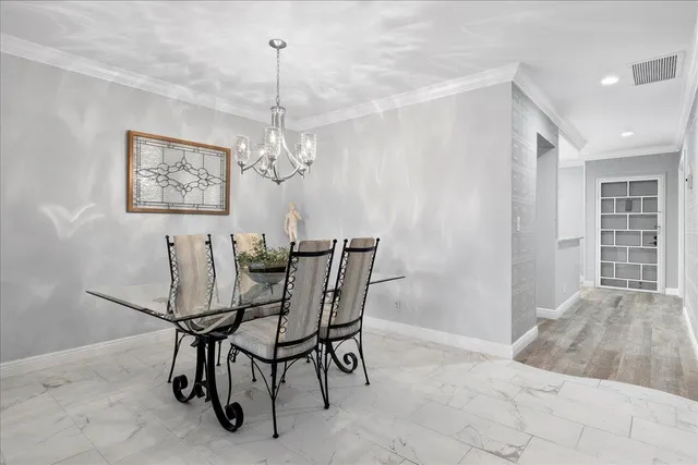 a view of a dining room with furniture