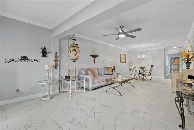 a living room with furniture and white walls