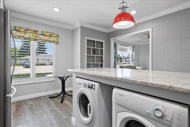 a view of livingroom with washer and dryer
