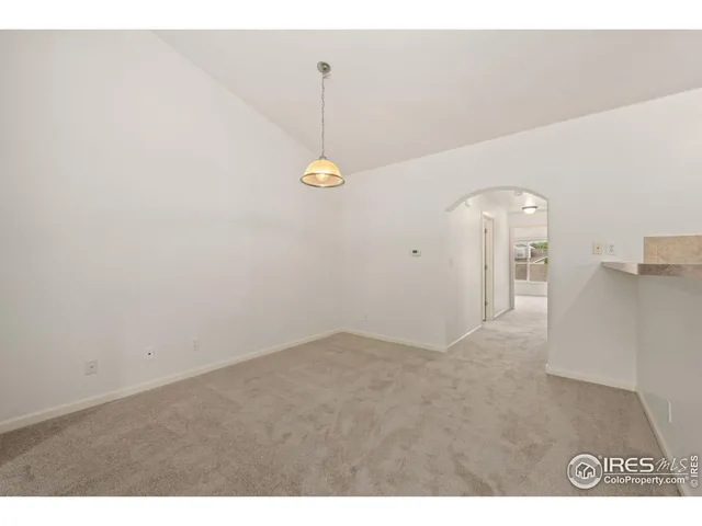 a view of a room with an empty space