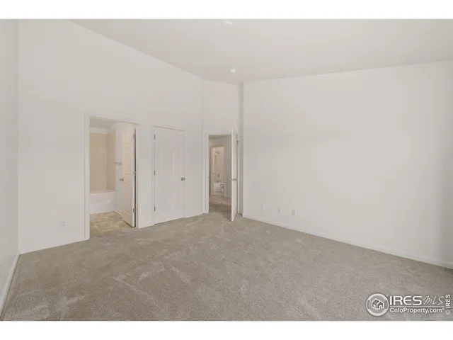 view of empty room with front door