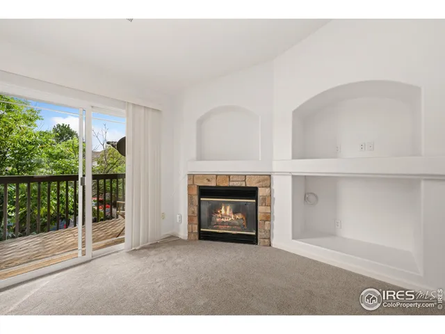 a living room with a fireplace