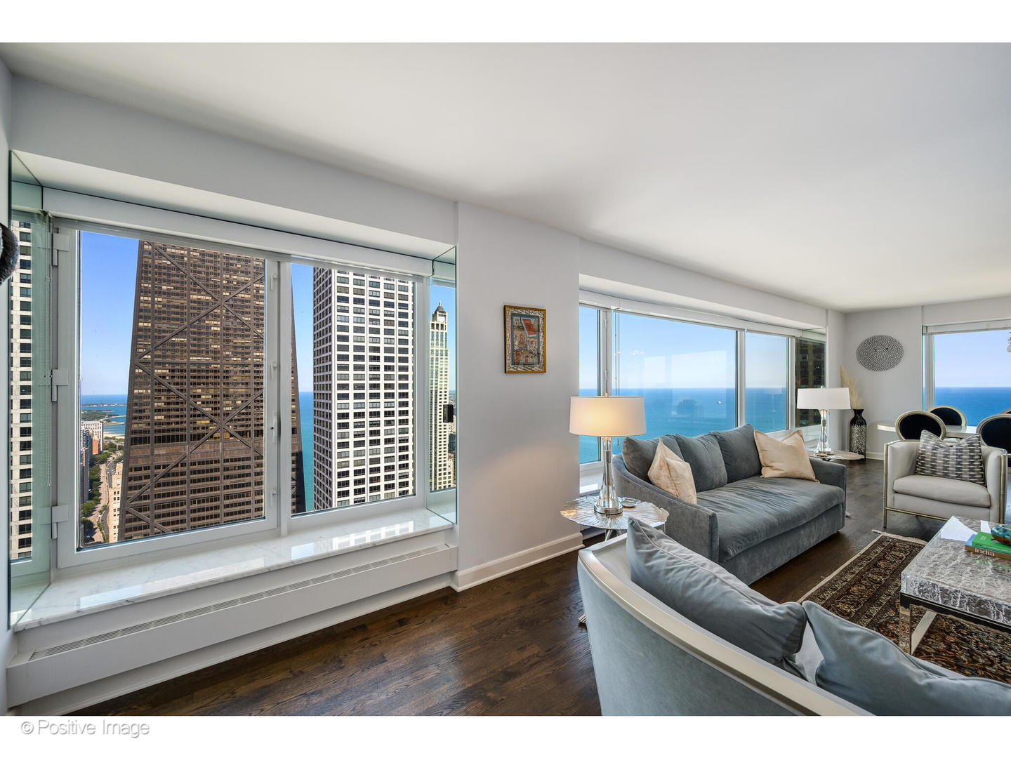 161 East Chicago Avenue, Unit 54A Chicago, IL 60611 - Photo 12 of 41 a living room with furniture and a window