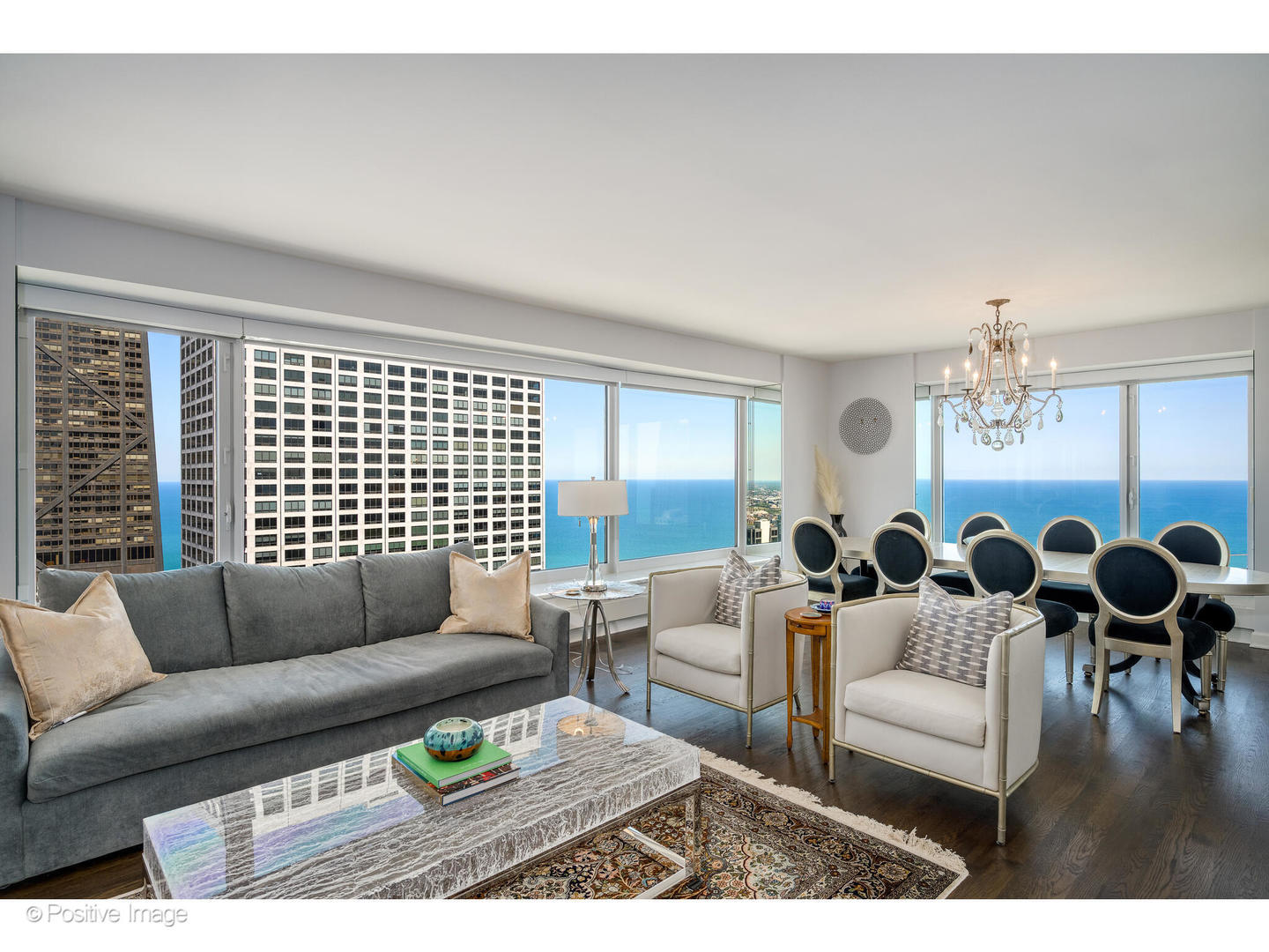 161 East Chicago Avenue, Unit 54A Chicago, IL 60611 - Photo 13 of 41 a living room with furniture and a large window