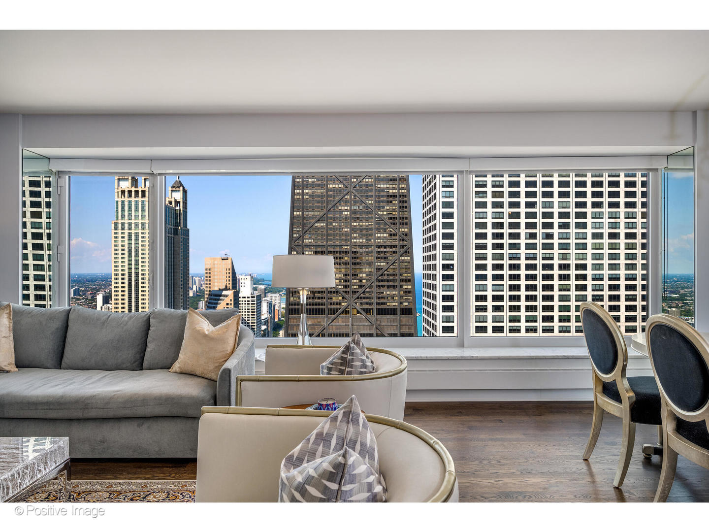 161 East Chicago Avenue, Unit 54A Chicago, IL 60611 - Photo 18 of 41 a living room with furniture and a window