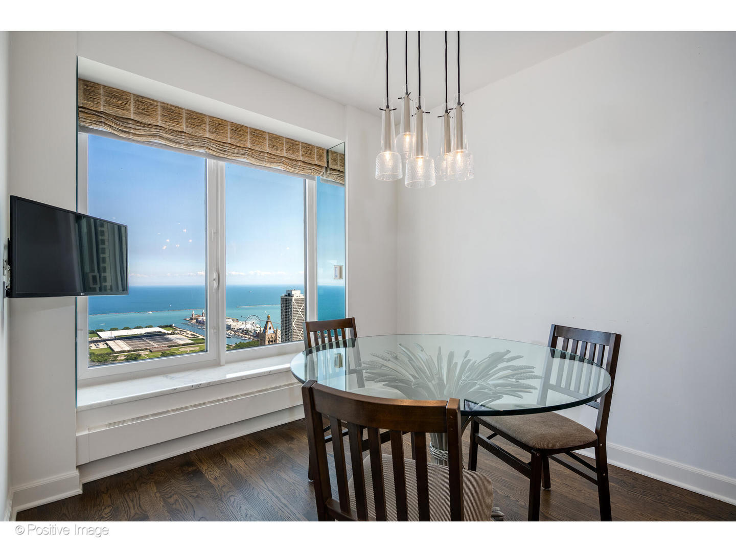 161 East Chicago Avenue, Unit 54A Chicago, IL 60611 - Photo 24 of 41 a outdoor dining room with furniture and window