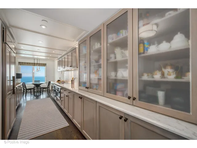 a open kitchen with breakfast area